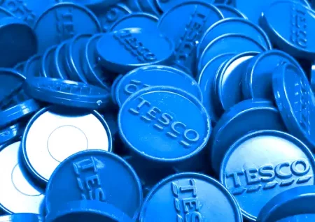 Closeup of a Pile of Tesco Blue Tokens